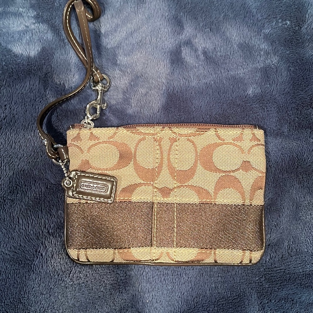 Tan/Brown signature Coach wristlet